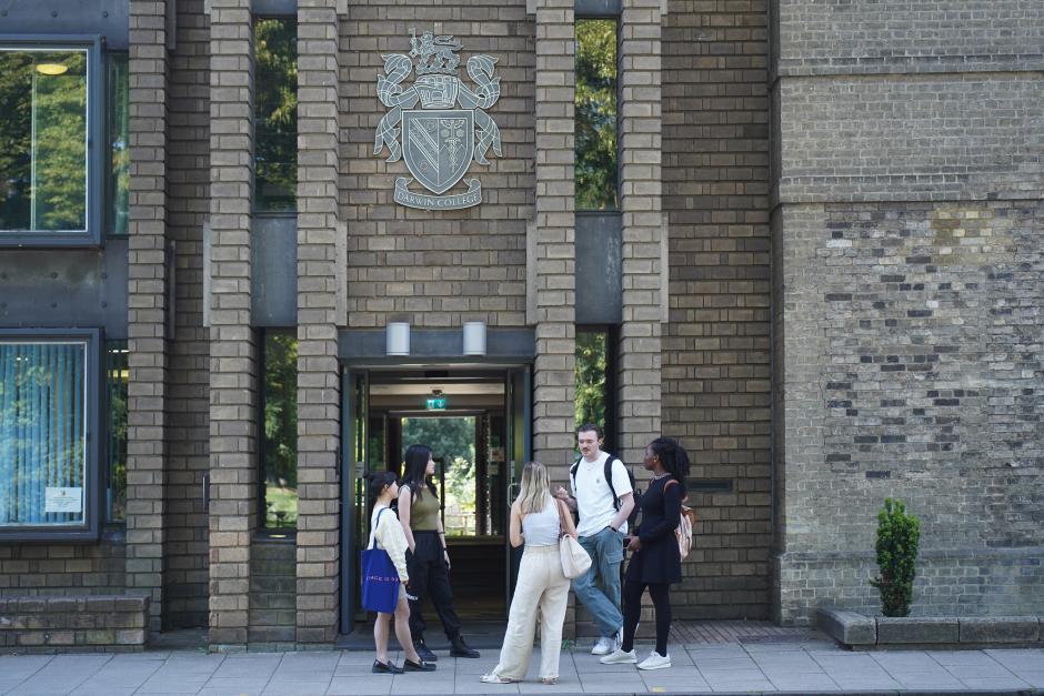 Students chatting outside Darwin College in Cambridge