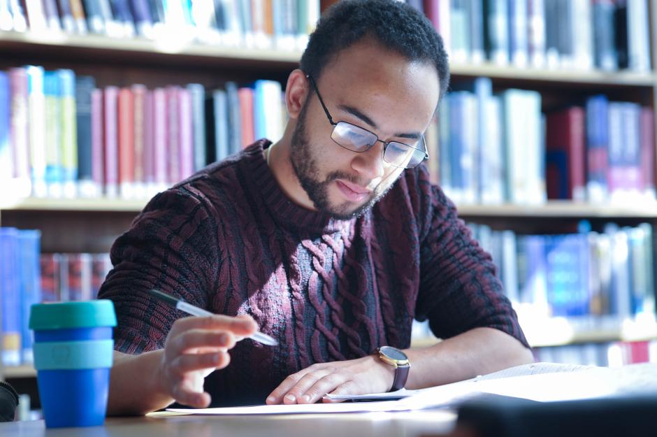 student working in library 